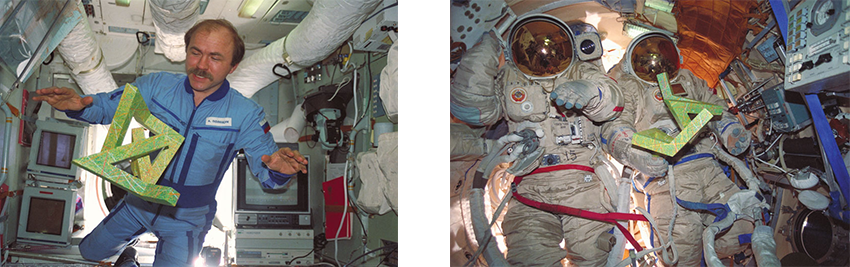 Cosmonaut Alexander Polischuk dancing with the Cosmic Dancer 
Cosmic Dancer in the Mir spacesuit chamber.